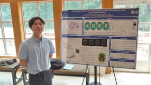 Allen showing his poster research project.